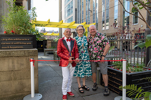 Pocket Park volunteers opening garden
