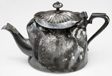 Cornelia Parker Object That Fell Off The White Cliffs Of Dover, 1992 A dented silver plate tea pot that fell off the white cliffs off Dover. White chalk deposits on the surface are from the cliff face
