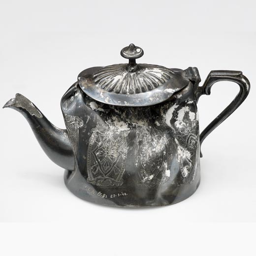 Cornelia Parker Object That Fell Off The White Cliffs Of Dover, 1992 A dented silver plate tea pot that fell off the white cliffs off Dover. White chalk deposits on the surface are from the cliff face
