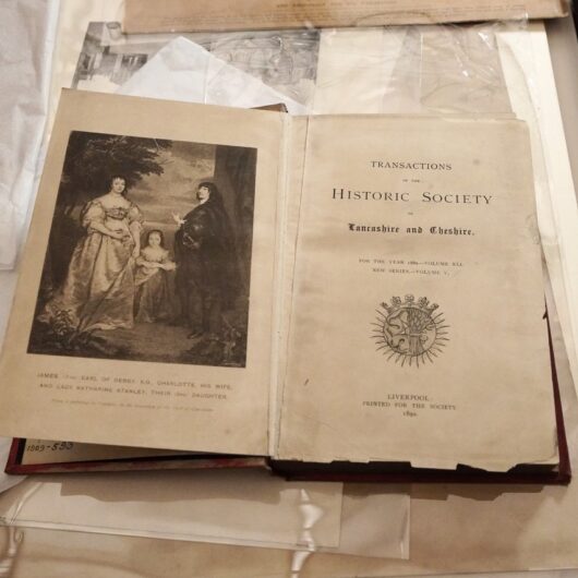 A open book with discoloured pages- text reads Historic Society, Lancashire and Cheshire