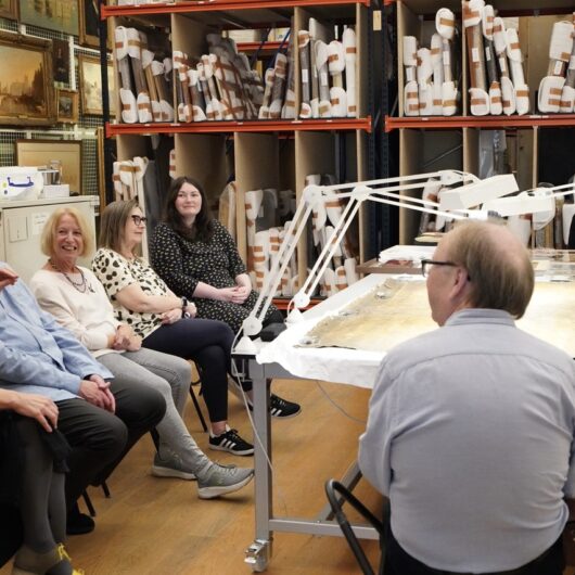 The group sat around a large table in discussion